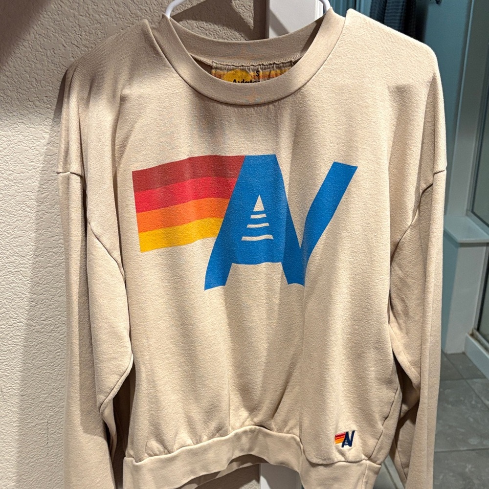 Aviator Nation Cream Crewneck Sweatshirt with Blue, Red & Yellow Logo